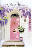 The setting evokes the tender excitement of moving into a fresh space in Upton Park, with every detail carefully composed to feel both welcoming and serene. At the centre is a softly painted pink front door, its pastel shade calm and reassuring, framed by whitewashed brick that adds texture without competing for attention. To one side, a matching blush shutter completes the façade, giving the doorway a balanced, homely character you might stumble upon while wandering the quieter streets off Green Street or near West Ham Park. Overhead, wisteria cascades in generous lavender drifts, its pendulous blooms tumbling down like fragrant ribbons that frame the entrance in natural elegance. At the threshold sits a simple grey metal bucket, repurposed with florist's flair into a vessel for a lavish bouquet of white and cream roses. The roses are fully open and plush, each bloom a swirl of soft petals that create gentle shadows and curves, cushioned by delicate green foliage that peeks through in artful touches. Around the base of the bucket, a satin ribbon in pale pink is tied neatly, its colour echoing the door and tying the scene together in one cohesive, pastel story. The light feels warm but not harsh, with dappled patterns of wisteria and leaves suggesting a mild afternoon. The mood is one of quiet joy and heartfelt congratulations, like the moment you arrive at your new address to find a housewarming bouquet waiting at the door. It's a floral scene that embodies the spirit of Upton Park-a place of everyday warmth, neighbourly kindness, and new memories just beginning to unfurl, petal by petal.